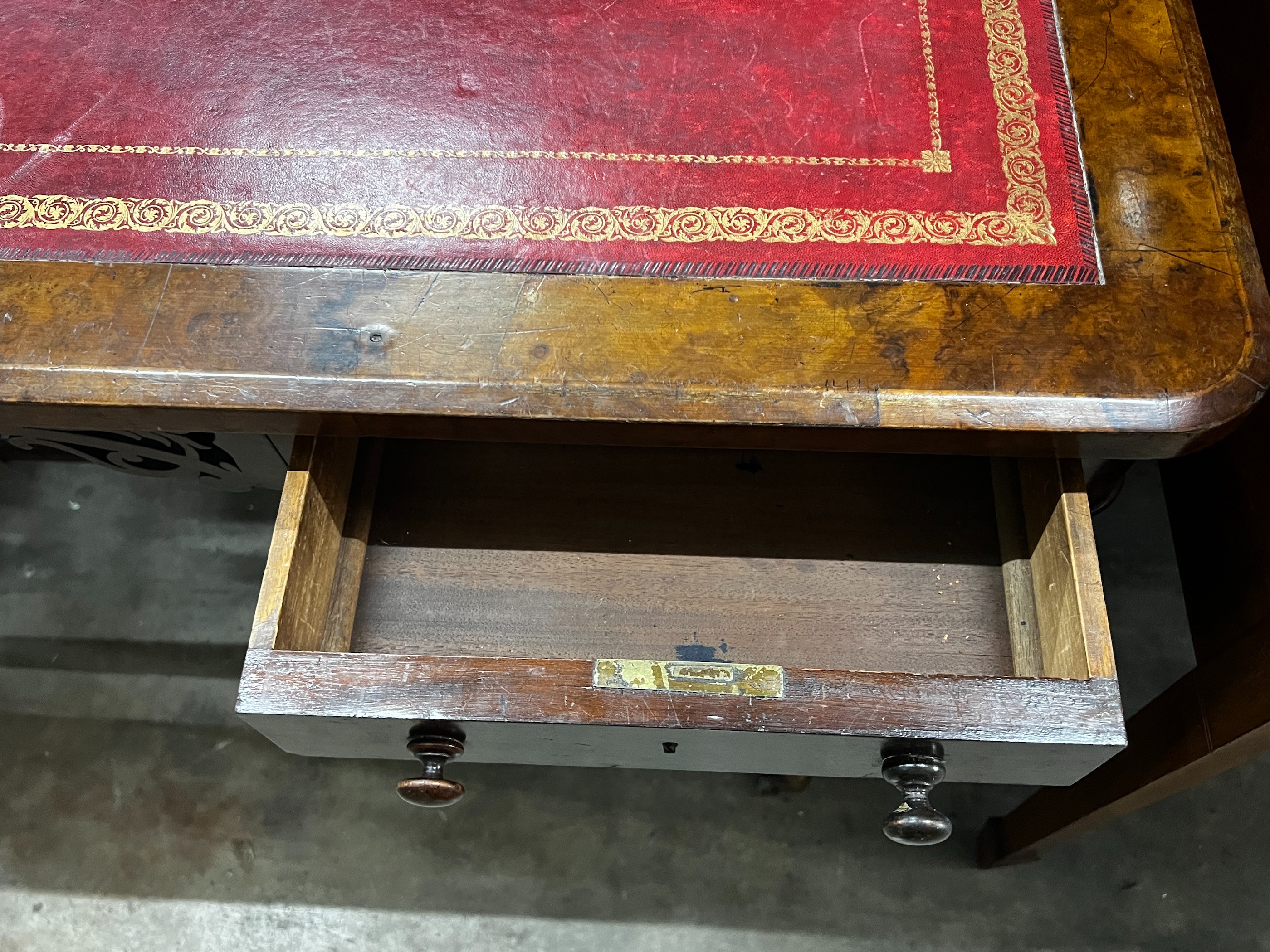 A Victorian walnut writing table, width 114cm, depth 52cm, height 73cm